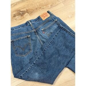 Levis 557 Relaxed Boot Cut Jeans Mens 36x32 Medium Wash Blue Denim Distressed